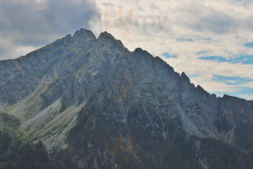 Malga Assenhutte, Scena