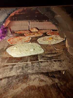 Pizzeria Rivetta, Urbe